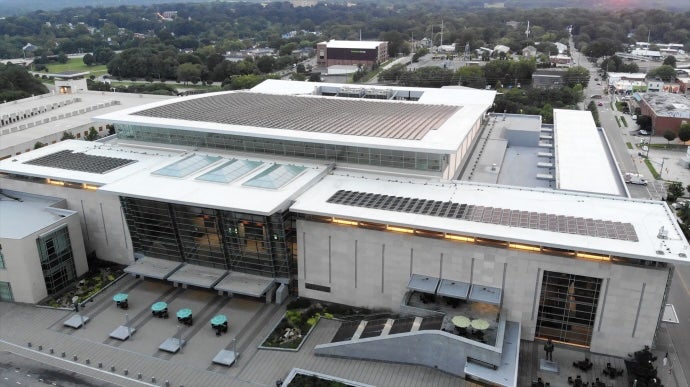 Bird's eye view of Raleigh Convention Center showing rooftop solar panels.